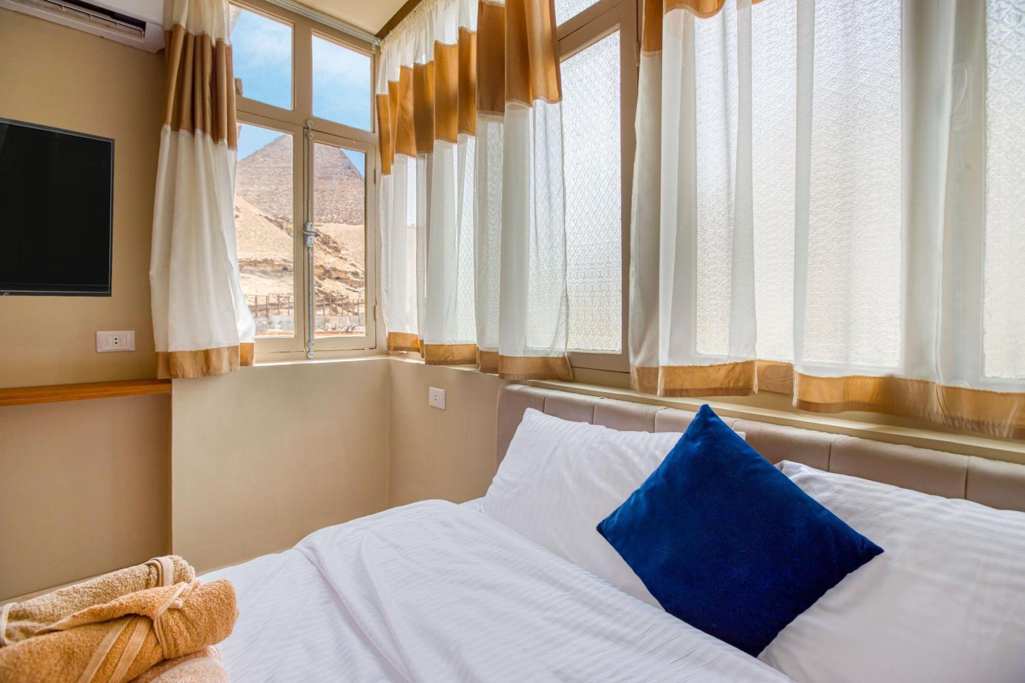 The Grand Pyramids View Hotel Kafret el-Gabal Pokoj fotografie