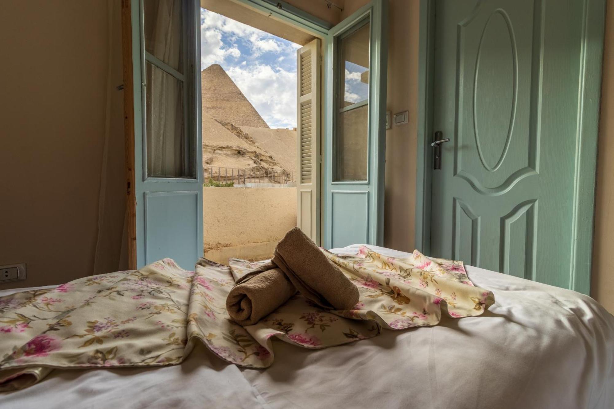 The Grand Pyramids View Hotel Kafret el-Gabal Pokoj fotografie