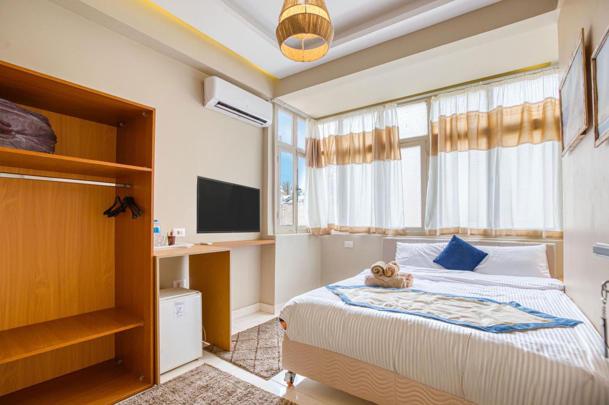 The Grand Pyramids View Hotel Kafret el-Gabal Pokoj fotografie