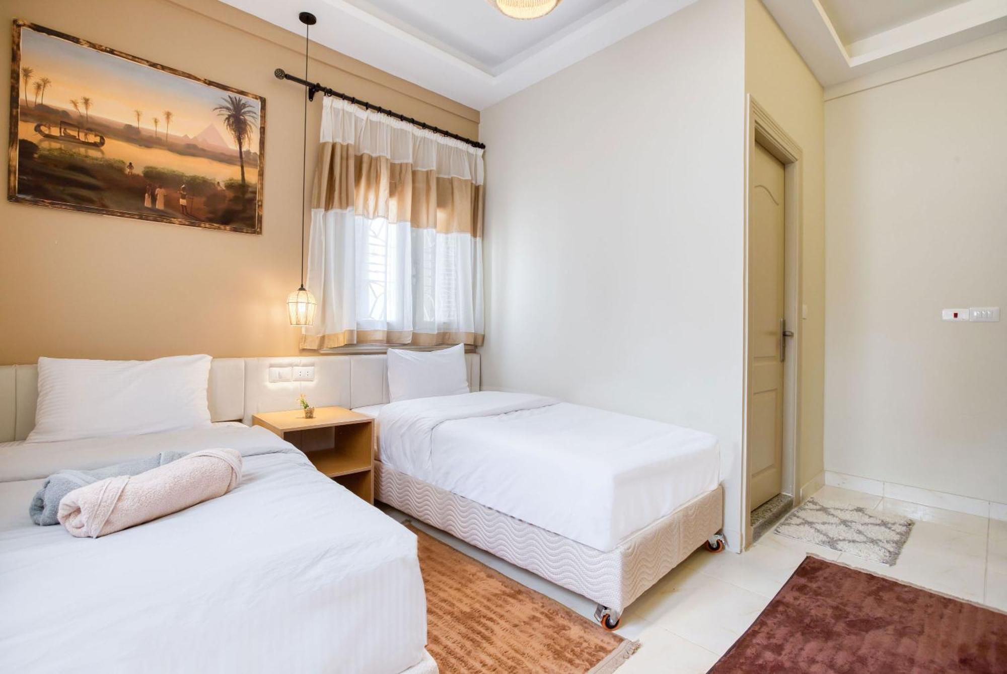 The Grand Pyramids View Hotel Kafret el-Gabal Pokoj fotografie